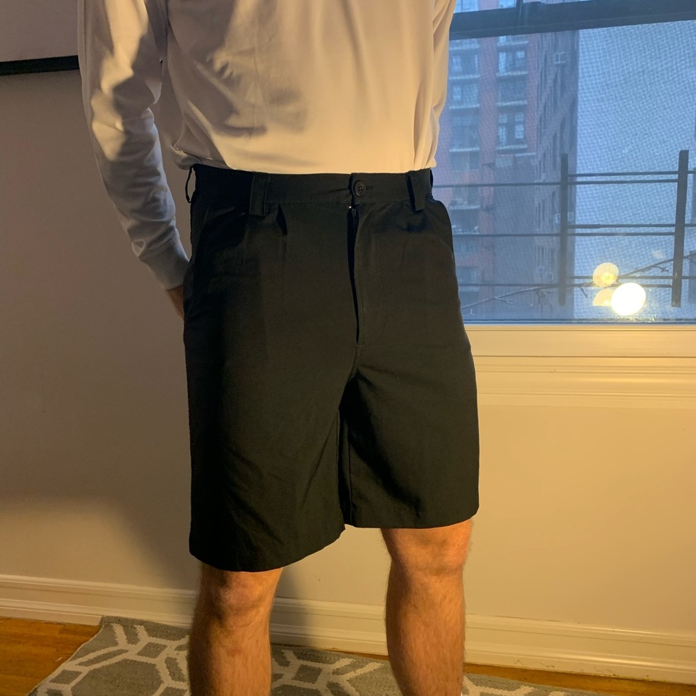 Black UA golf shorts